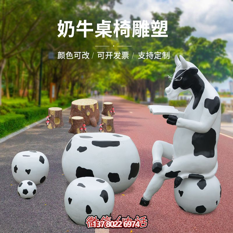 玻璃鋼雕塑牛只著看書桌椅,林中戶外休閑體驗 玻璃鋼雕塑牛只著看書桌椅,林中戶外休閑體驗