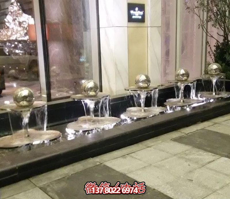 不銹鋼鏡面小型噴泉雕塑——點綴售樓部的精致之美 不銹鋼鏡面小型噴泉雕塑——點綴售樓部的精致之美