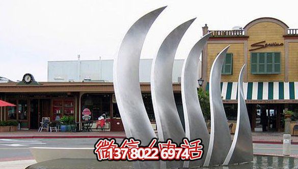 抽象不銹鋼翅膀雕塑將庭院與創意完美結合 抽象不銹鋼翅膀雕塑將庭院與創意完美結合